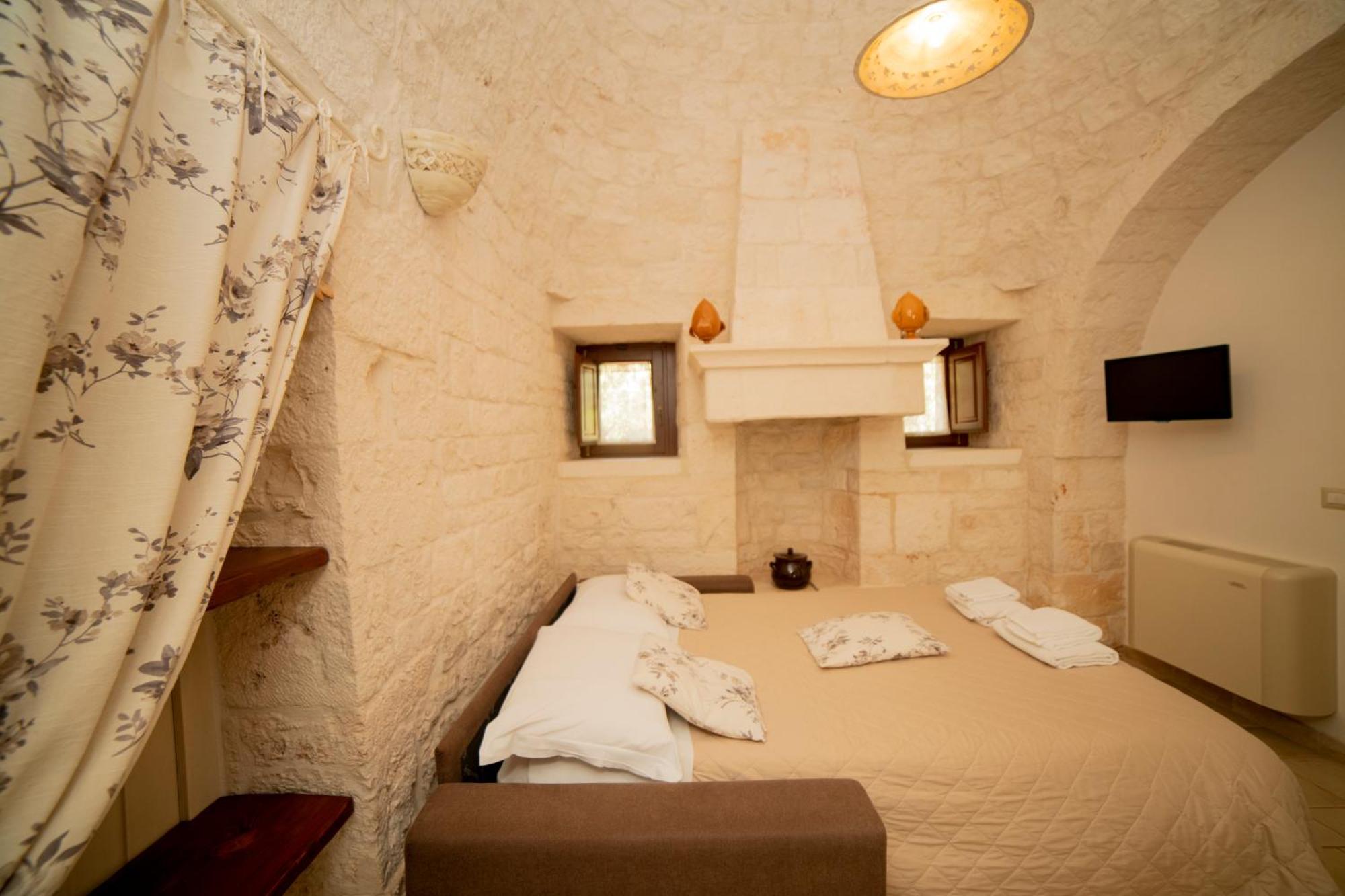 Trulli Arco Antico Villa โลโกโรตอนโด ภายนอก รูปภาพ